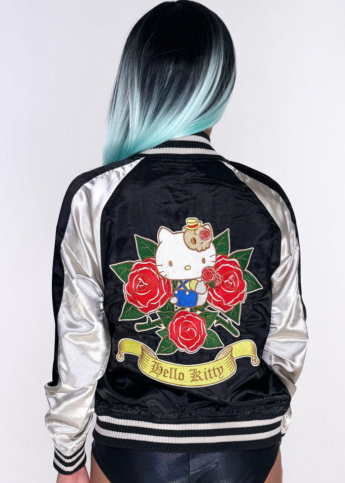 Sanrio Hello Kitty Rose Tattoo Bomber Jacket in black gold with Hello Kitty embroidery and rose tattoo design on satin fabric — model back view