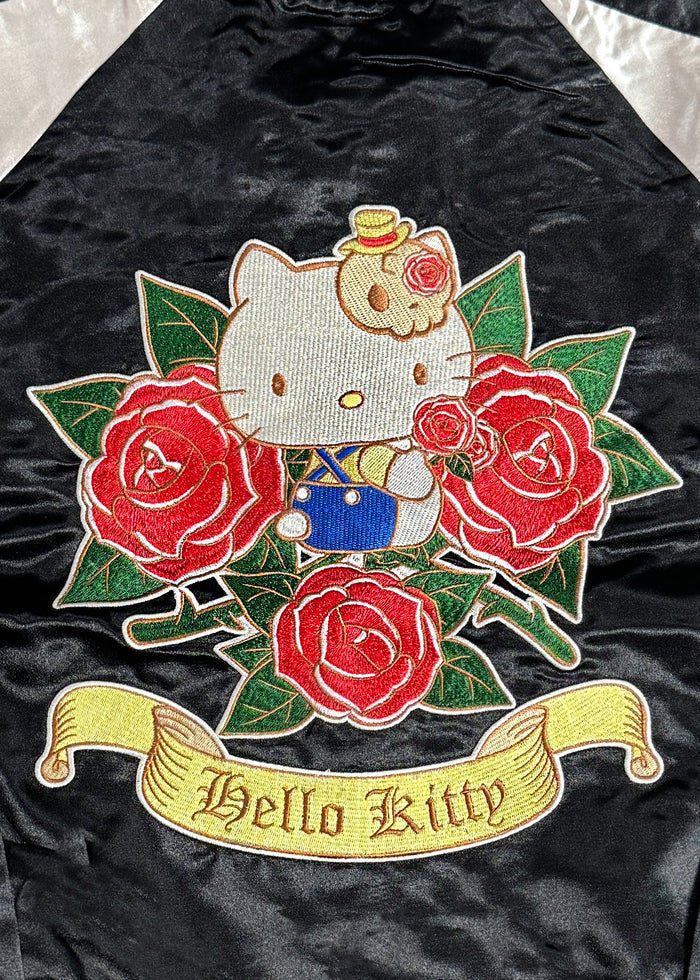 Sanrio Hello Kitty Rose Tattoo Bomber Jacket in black gold with Hello Kitty embroidery and rose tattoo design on satin fabric — back detail view