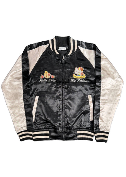 Sanrio Hello Kitty Rose Tattoo Bomber Jacket in black gold with Hello Kitty embroidery and rose tattoo design on satin fabric — flat lay view