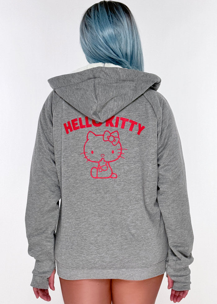 Sanrio Hello Kitty Sherpa Zip Up Hoodie in grey with Hello Kitty embroidery on sherpa-lined zip-up rave festival jacket — model back view