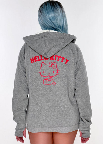 Sanrio Hello Kitty Sherpa Zip Up Hoodie in grey with Hello Kitty embroidery on sherpa-lined zip-up rave festival jacket — model back view