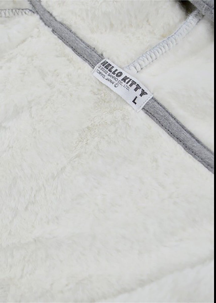 Sanrio Hello Kitty Sherpa Zip Up Hoodie in grey with Hello Kitty embroidery on sherpa-lined zip-up rave festival jacket — embroidery detail view