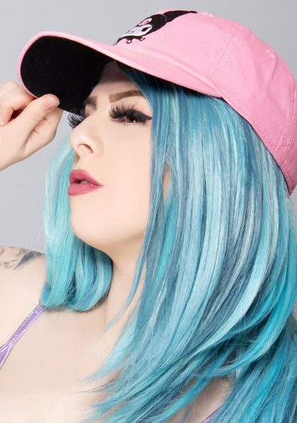 Bioworld Sanrio Kuromi Embroidered Raglan Hat in pink with embroidered Kuromi front detail on kawaii fandom rave festival hat — model side view