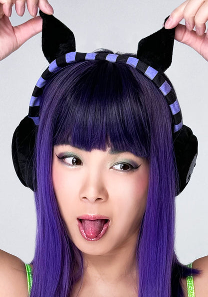 Bioworld Sanrio Kuromi Foldable Cosplay Earmuff in black purple — model front view