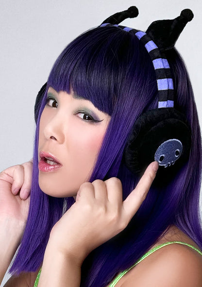 Bioworld Sanrio Kuromi Foldable Cosplay Earmuff in black purple — model side view