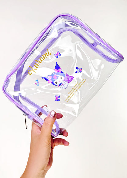 Sanrio Kuromi Vinyl Cosmetic Bag in clear with Kuromi print detail on transparent vinyl and zipper closure — detail view