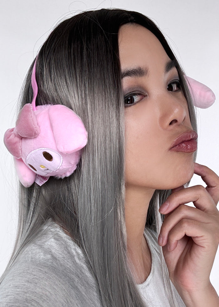 Sanrio My Melody 3D Plush Earmuff in pink with 3D My Melody plush ear cups on rave festival earmuff accessory — model front view