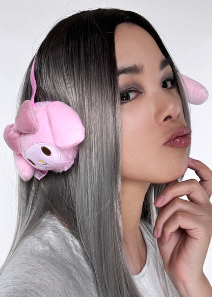 Sanrio My Melody 3D Plush Earmuff in pink with 3D My Melody plush ear cups on rave festival earmuff accessory — model front view