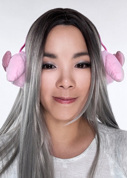Sanrio My Melody 3D Plush Earmuff in pink with 3D My Melody plush ear cups on rave festival earmuff accessory — model side view
