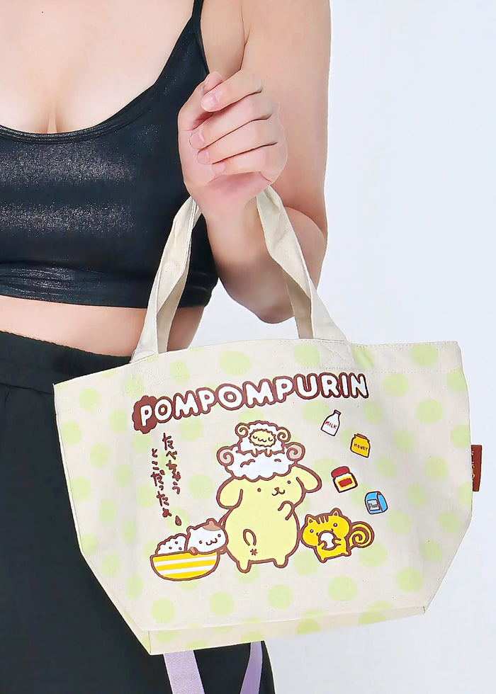 Sanrio Pompompurin Polka Dot Canvas Tote in green with Pompompurin and friends graphic print in polka dot design — detail view