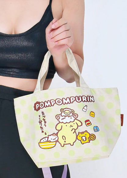 Sanrio Pompompurin Polka Dot Canvas Tote in green with Pompompurin and friends graphic print in polka dot design — detail view