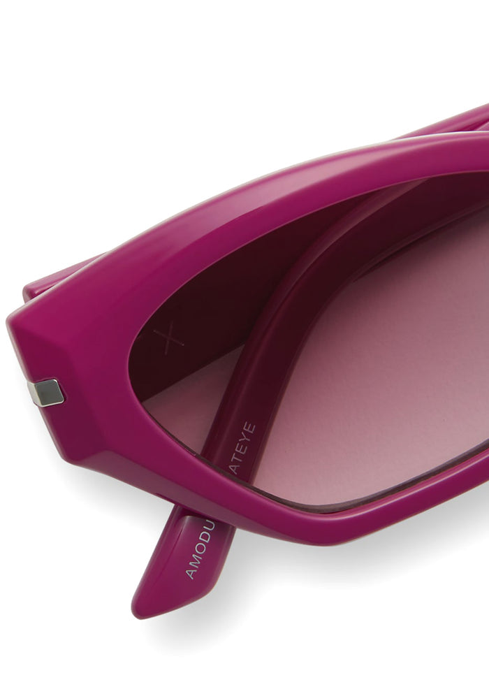 Dime Optics Sawtelle Polarized Sunglasses in glossy berry garnet gradient — detail view
