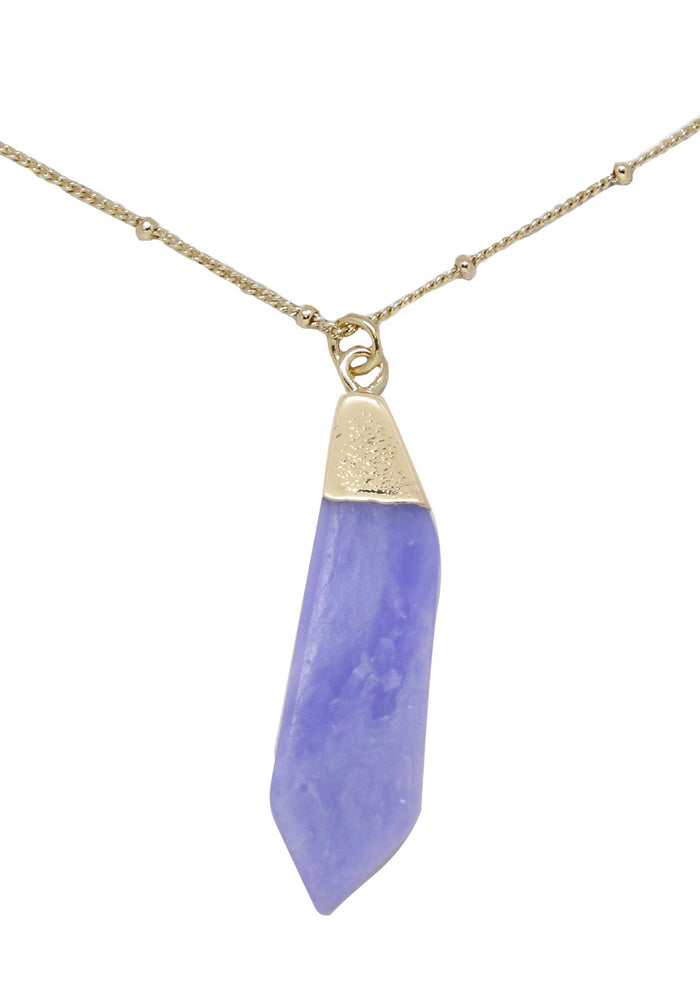 Charged Serenity Blue Agate Gemstone Necklace in gold with raw blue agate stone pendant on 18k gold plated chain crystal festival necklace — front view