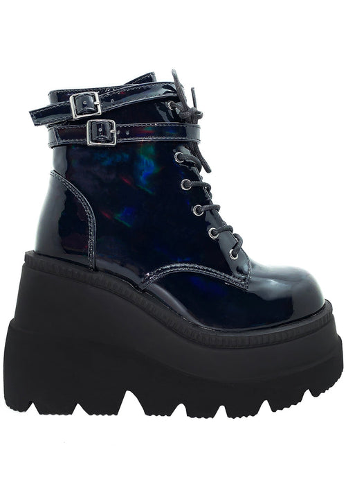 Demonia SHAKER 52 Hologram Black Platform Boots in iridescent holographic vegan leather with double buckled ankle straps and wedge platform sole — front view