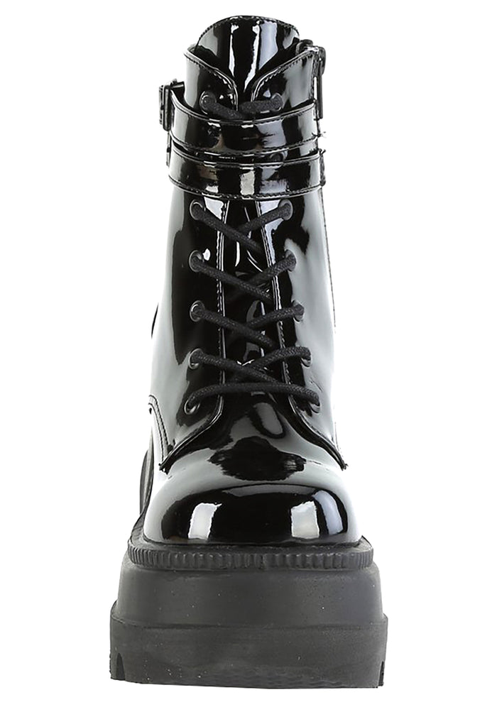 Demonia SHAKER 52 Paint it Black Patent Black Platform Boots in black patent leather showing 4.5 inch stacked wedge platform height and traction sole — side view