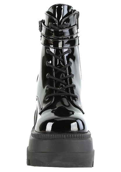 Demonia SHAKER 52 Paint it Black Patent Black Platform Boots in black patent leather showing 4.5 inch stacked wedge platform height and traction sole — side view