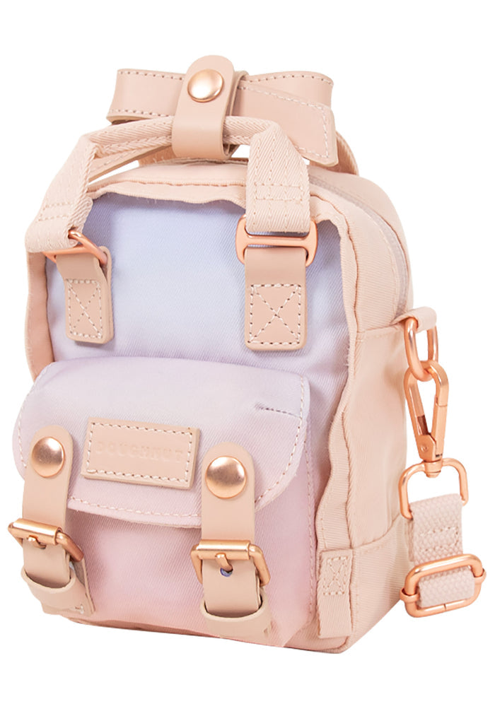 Doughnut Official Sky x Ribbon Series Macaroon Tiny Crossbody Bag in soft sunrise — side view