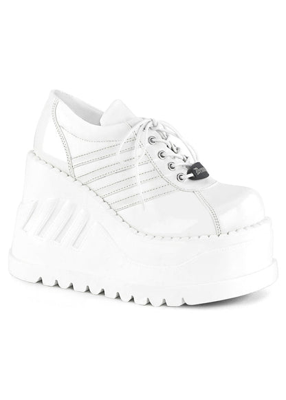 Demonia STOMP 08 White Rave Platform Sneakers in white matte and patent vegan leather with sporty stripe detail and 4.75 inch chunky rubber wedge platform — front view