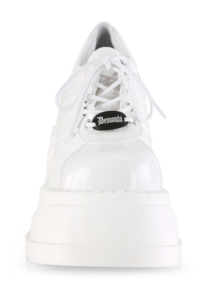 Demonia STOMP 08 White Rave Platform Sneakers in white vegan leather showing 4.75 inch chunky wedge platform height and traction sole — side view