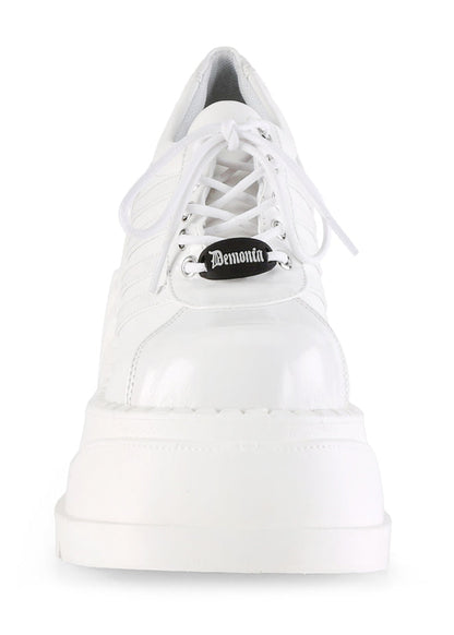 Demonia STOMP 08 White Rave Platform Sneakers in white vegan leather showing 4.75 inch chunky wedge platform height and traction sole — side view