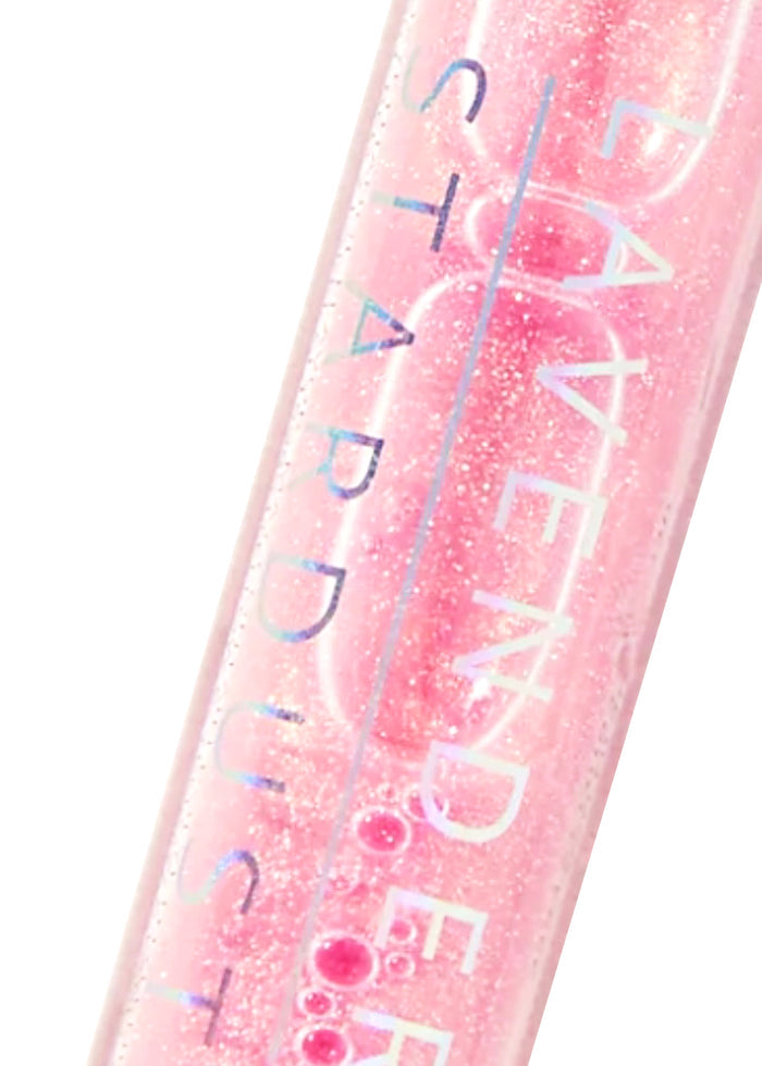 Lavender Stardust Strawberry Sparkle Cosmic Lip Gloss in light pink — detail view