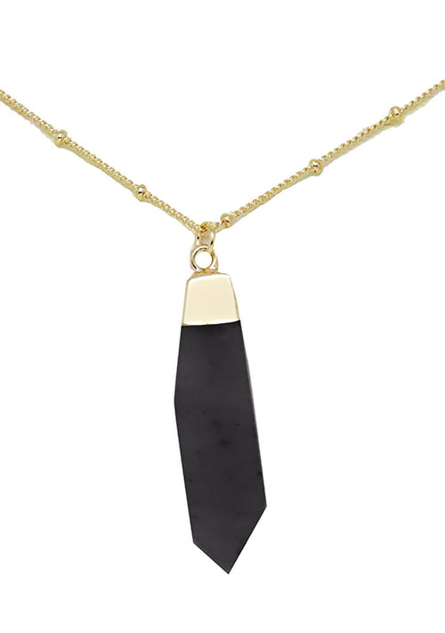 Charged Strength Onyx Gemstone Necklace in gold with raw black onyx stone pendant on 18k gold plated chain crystal festival necklace — front view