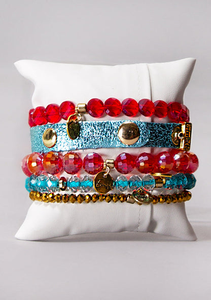 Erimish Sugar and Spice Bracelet Stack in red blue gold with vegan leather band on festival bracelet stack — back model view