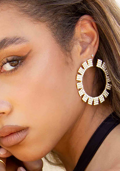 Ettika Sunbeam Crystal Earrings in gold — model view