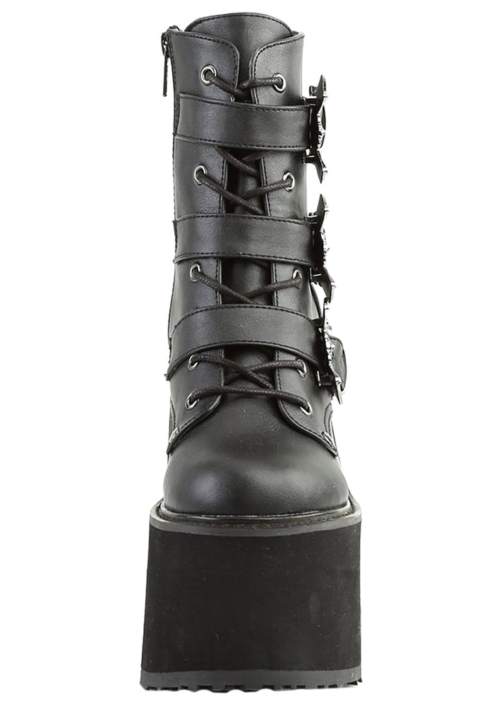 Demonia SWING 103 Creature of the Night Black Platform Boots in black vegan leather showing 5.5 inch wedge platform height and bat buckle detail — side view