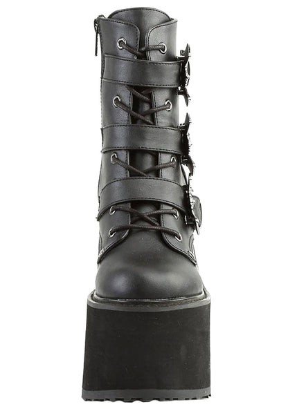 Demonia SWING 103 Creature of the Night Black Platform Boots in black vegan leather showing 5.5 inch wedge platform height and bat buckle detail — side view