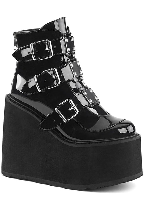 Demonia SWING 105 Dark Resistance Patent Black Platform Boots in black patent leather with 3 metal plate buckle straps and 5.5 inch EVA foam platform — front view