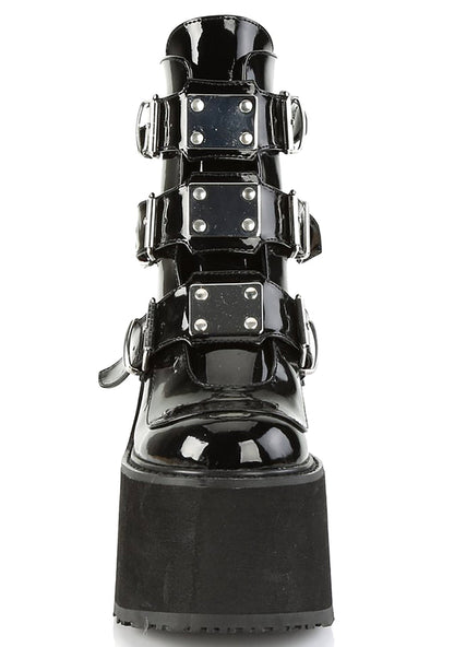 Demonia SWING 105 Dark Resistance Patent Black Platform Boots in black patent leather showing ankle boot height and 5.5 inch EVA foam platform — side view