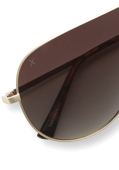 Dime Optics Tarzana Polarized Sunglasses in gold brown — detail view