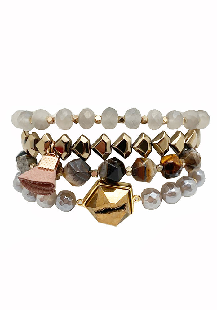 Erimish Vanity Affair Bracelet Stack in gold multicolor with bronze accents and natural stone centerpiece charms on festival bracelet stack — front view