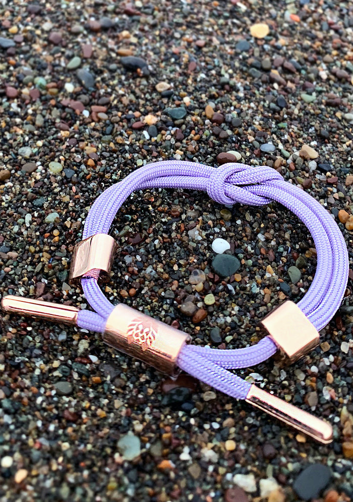 Rastaclat Violet II Women's Knotaclat Bracelet in lavender rose gold — model view