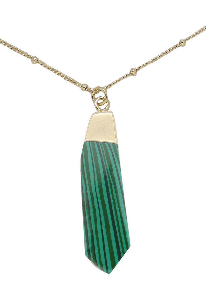 Charged Wisdom Malachite Gemstone Necklace in gold with raw green malachite stone pendant on 18k gold plated chain crystal festival necklace — front view