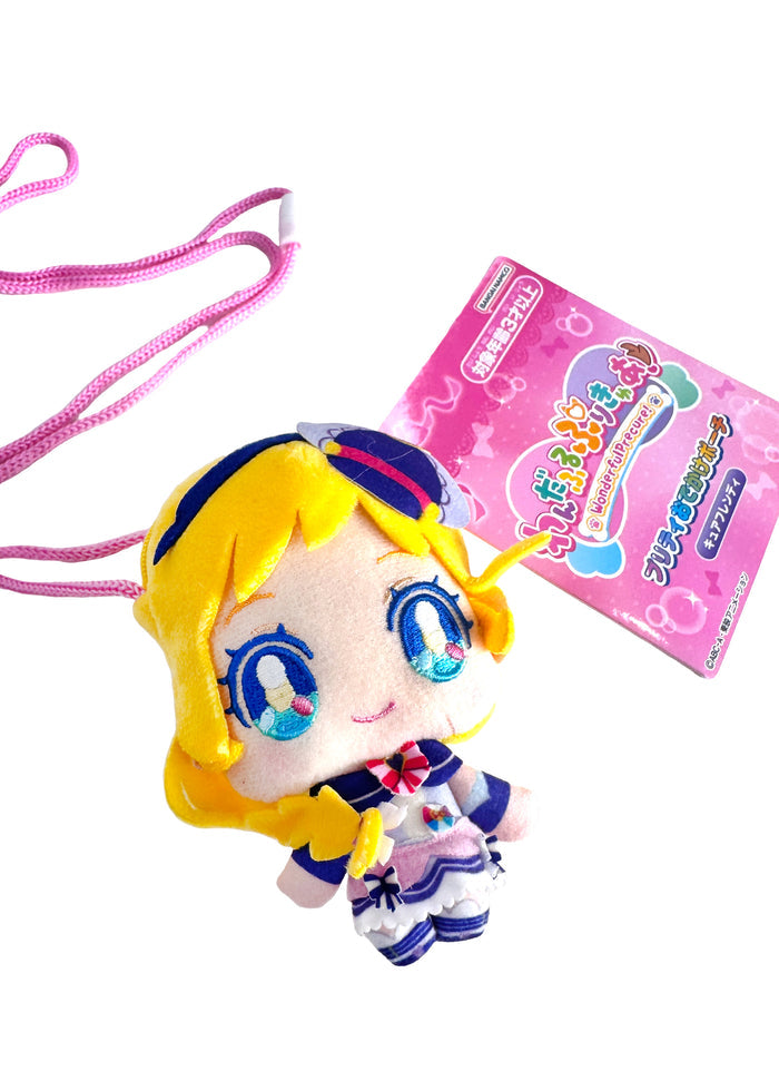Bandai Wonderful PreCure Inukai Iroha Plush Mascot Mini Pouch in yellow with 3D chibi Iroha magical girl design — lifestyle view