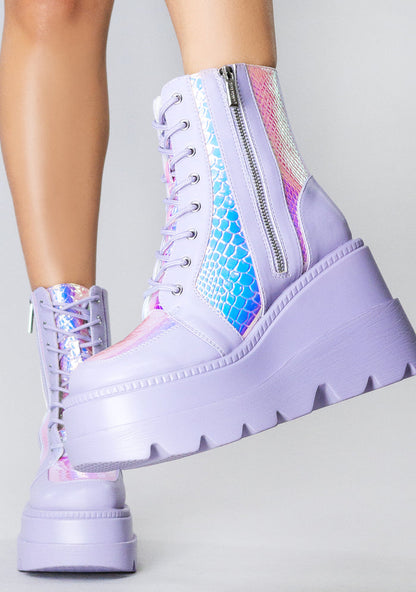 Front view of the exclusive RADIO Fairy Kiss lavender platform boots on-model, showcasing the purple laces, secure metal eyelets, and lightweight chunky festival boot silhouette.