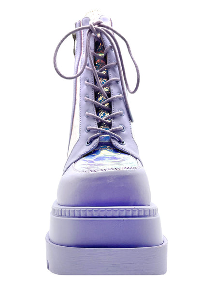 Studio front profile of the Cape Robbin X LASR exclusive lavender purple boots, emphasizing the wide textured toe cap, crisp matching laces, and rugged platform tread.