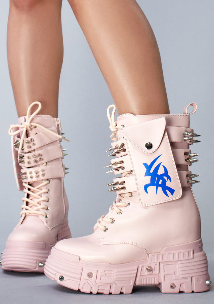 Front on-foot styling view of a pair of Anthony Wang X WTF CV Chem Baby Metal Pink platform boots featuring a classic lace-up front design and heavy industrial-style hardware