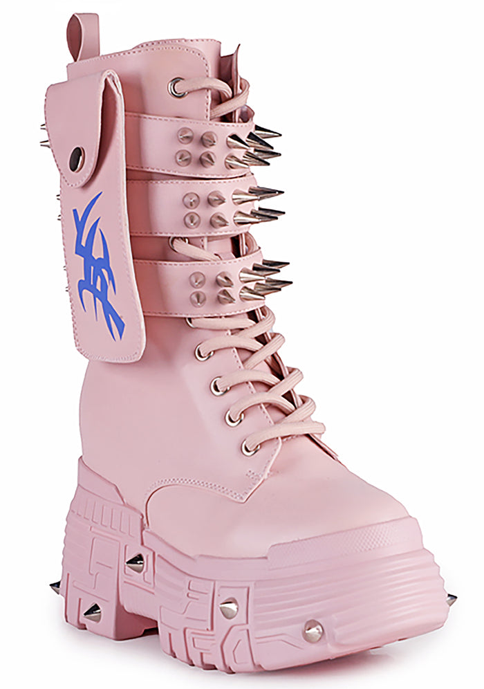 Three-quarter studio view of Anthony Wang X WTF CV Chem Baby Metal Pink platform boots highlighting the blocky toe cap guard, layered structural panels, and alternative festival streetwear silhouette