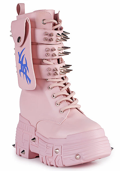 Three-quarter studio view of Anthony Wang X WTF CV Chem Baby Metal Pink platform boots highlighting the blocky toe cap guard, layered structural panels, and alternative festival streetwear silhouette